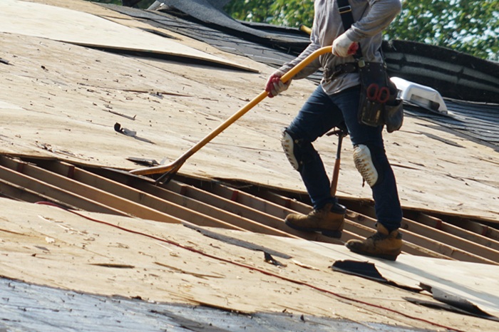 How Do Roofing Contractors Manage Waste and Debris During a Project?